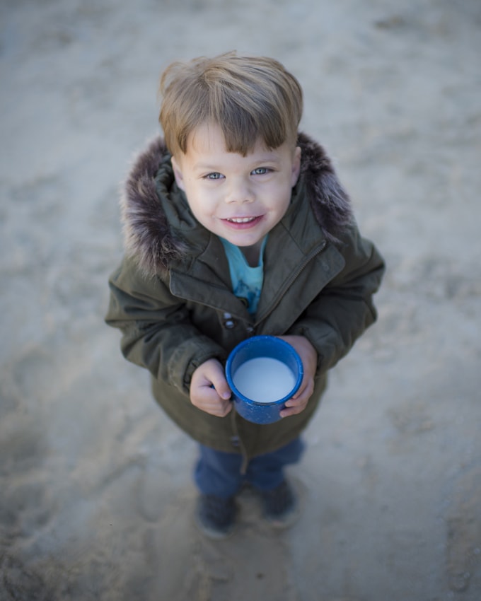 Cute toddler with cup
