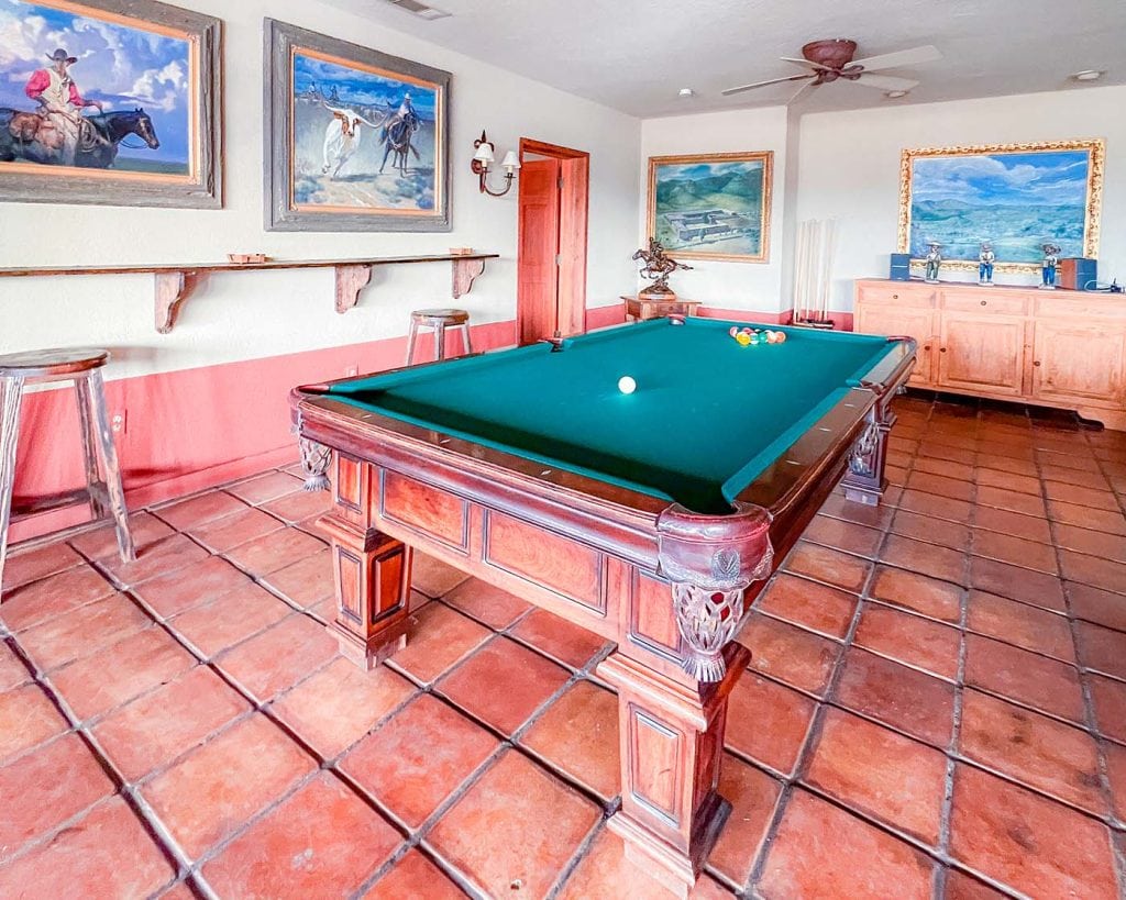 Pool table and game room available at the adventure resort Cibolo Creek Ranch in West Texas